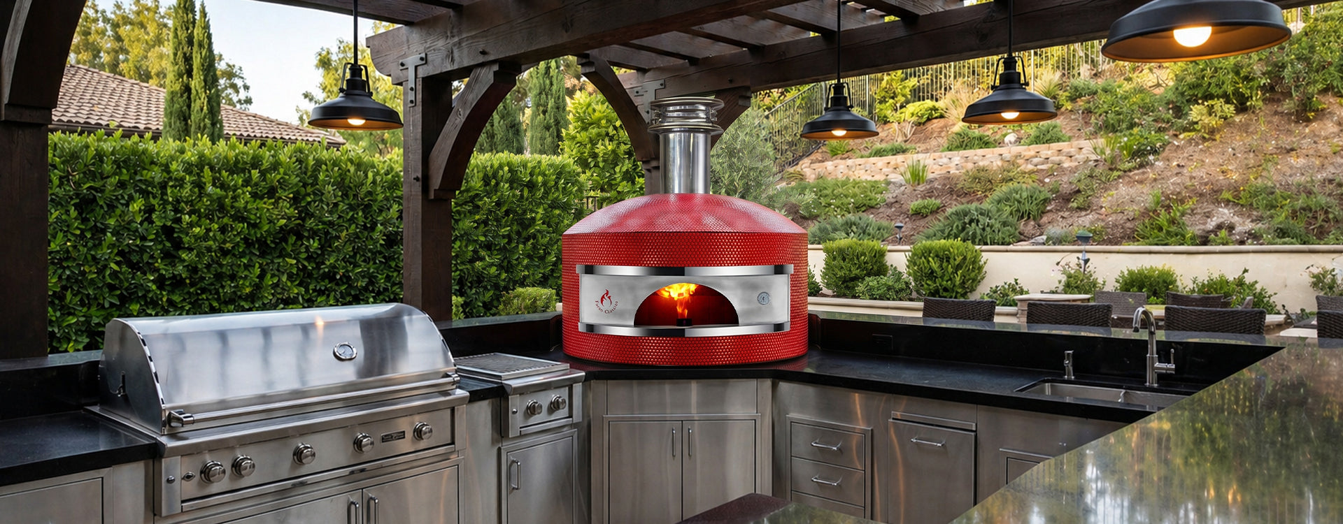 Outdoor kitchen with a Forno Classico pizza oven and grill area.