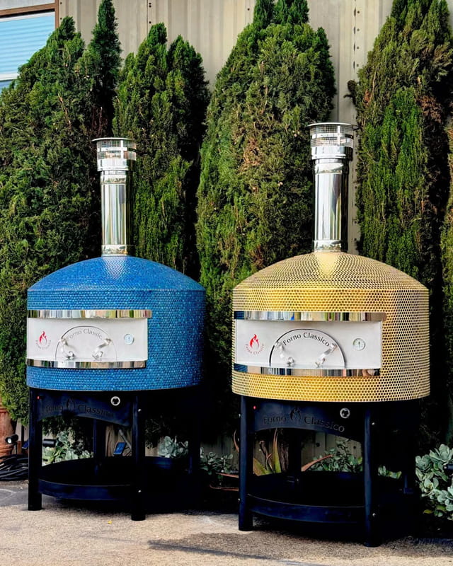 Two newly build Forno Classico Napoli that has the features the color Lagoon, and Gold.